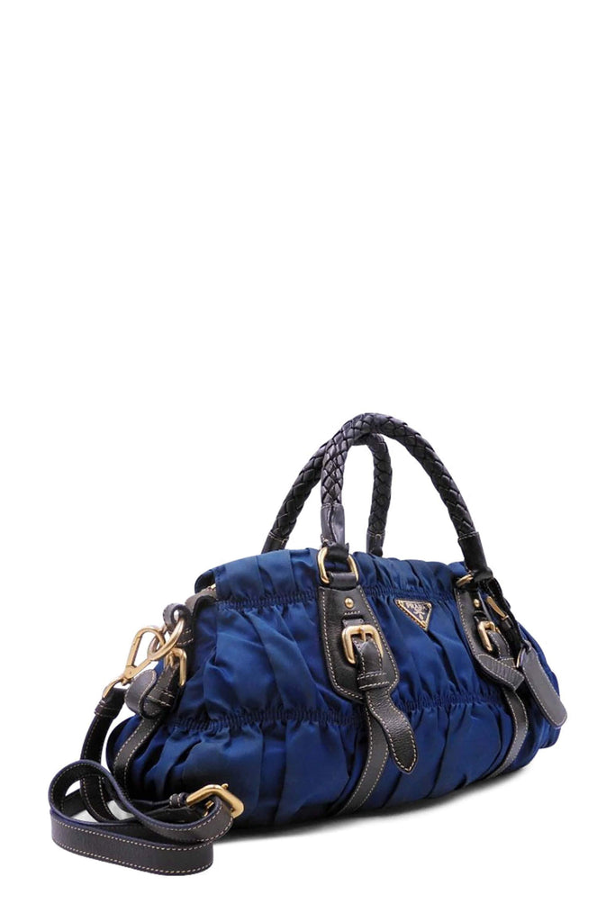 Shop preloved and authentic Bauletto Tessuto Braided Top Handle Bag Blue Black Bags by Prada from Second Edit in {{ shop.address.country }}