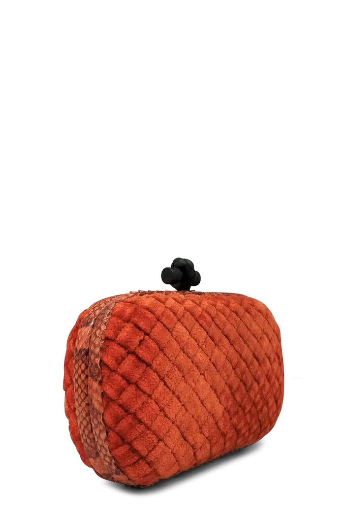 Shop preloved and authentic Ayers-Trimmed  Intrecciato Velvet Knot Clutch Orange Bags by Bottega Veneta from Second Edit in {{ shop.address.country }}