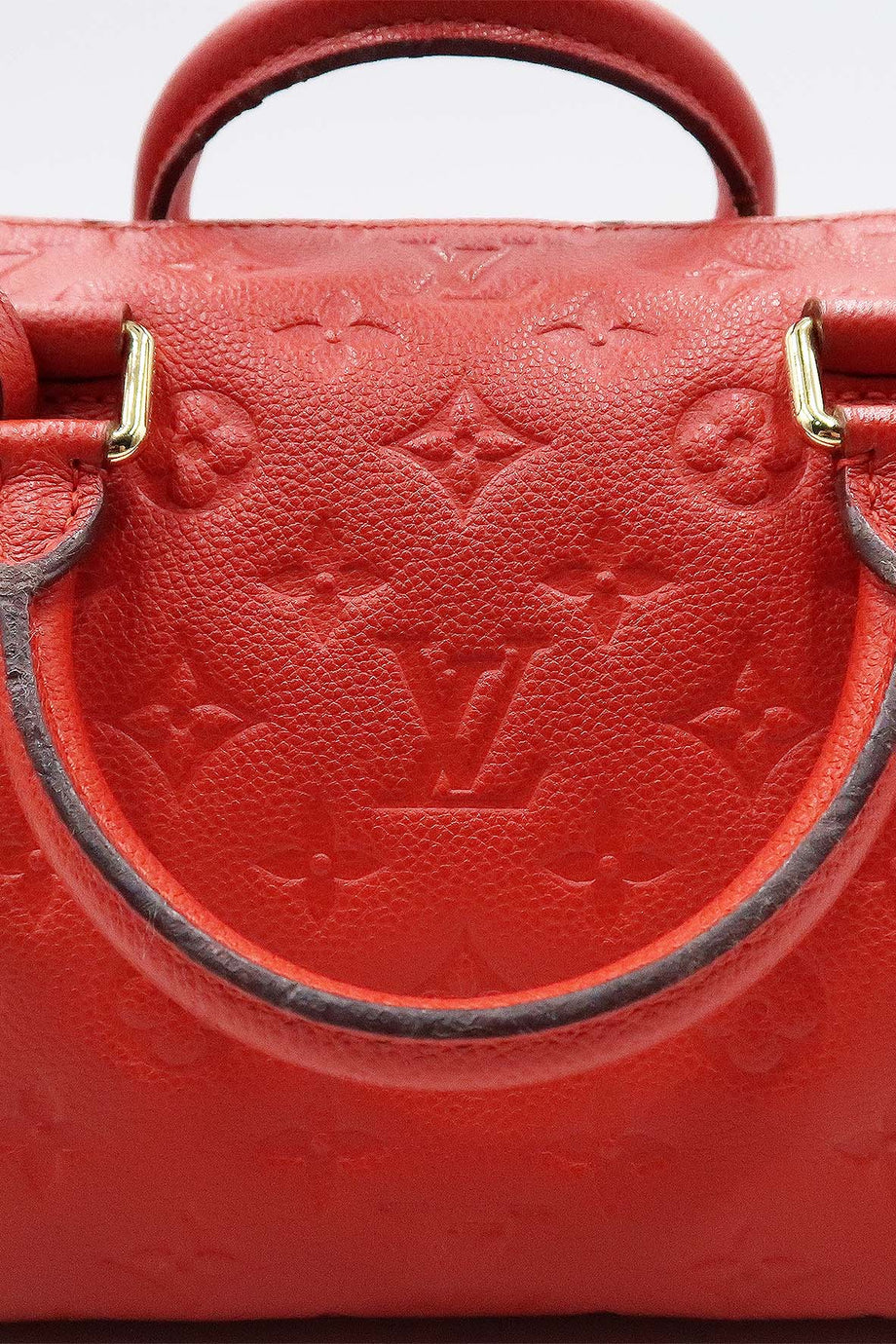 RvceShops Revival, Sac à main Louis Vuitton Speedy 25 cm en cuir monogram  empreinte rouge